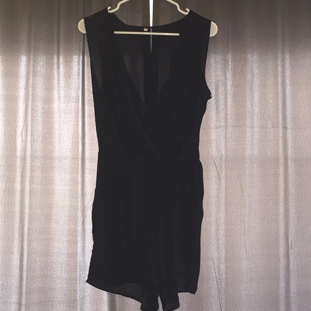 Black V neck romper with pockets!